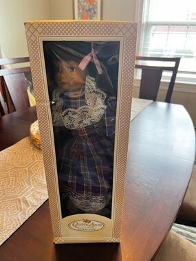 Queen Anne Afro American porcelain doll.  New in box